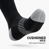 A single black athletic sock with gray heel, toe, and striped arch support, shown floating on a light gray background with the text 'CUSHIONED SOLE Soft Impact Protection'.