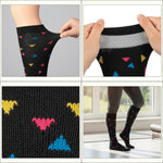 Black knee-high socks with colorful heart patterns, shown from different angles.
