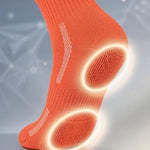Orange sock with cushioned sole technology on a gray background