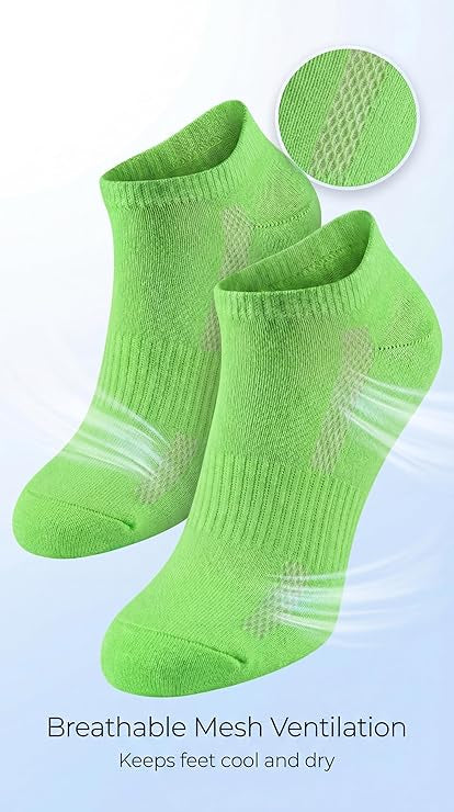 Green socks with breathable mesh design on a light gray background