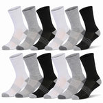 Eight pairs of crew socks arranged in two rows of four on a light gray background. The socks come in white, light gray, and black colorways, with ribbed cuffs and striped cushioning zones on the sides.