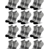 Multiple pairs of gray ankle socks with black toes and heels on a white background