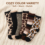 Set of patterned socks on a textured fabric background with text 'Cozy Color Variety'.
