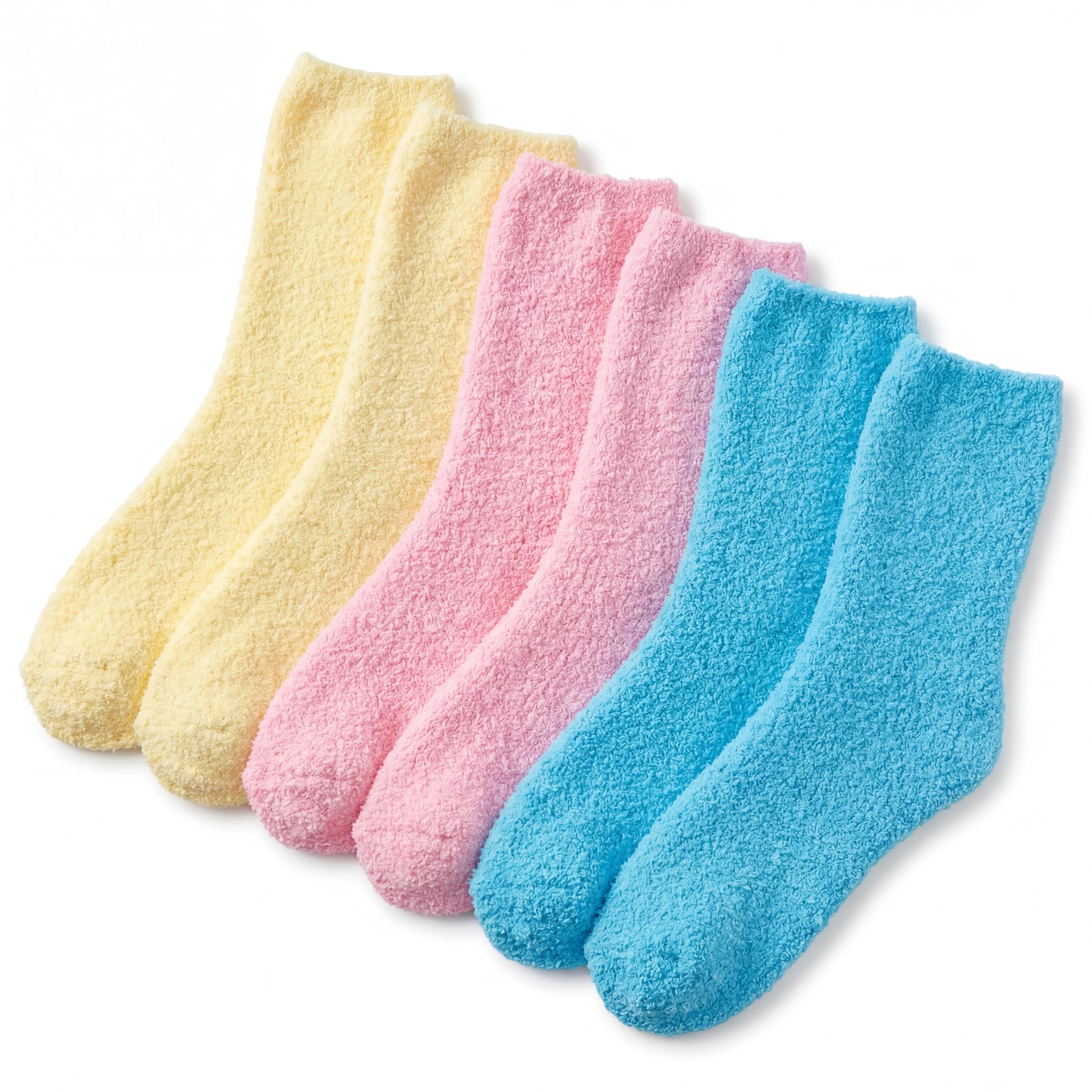 Set of three pairs of pastel-colored socks on a white background