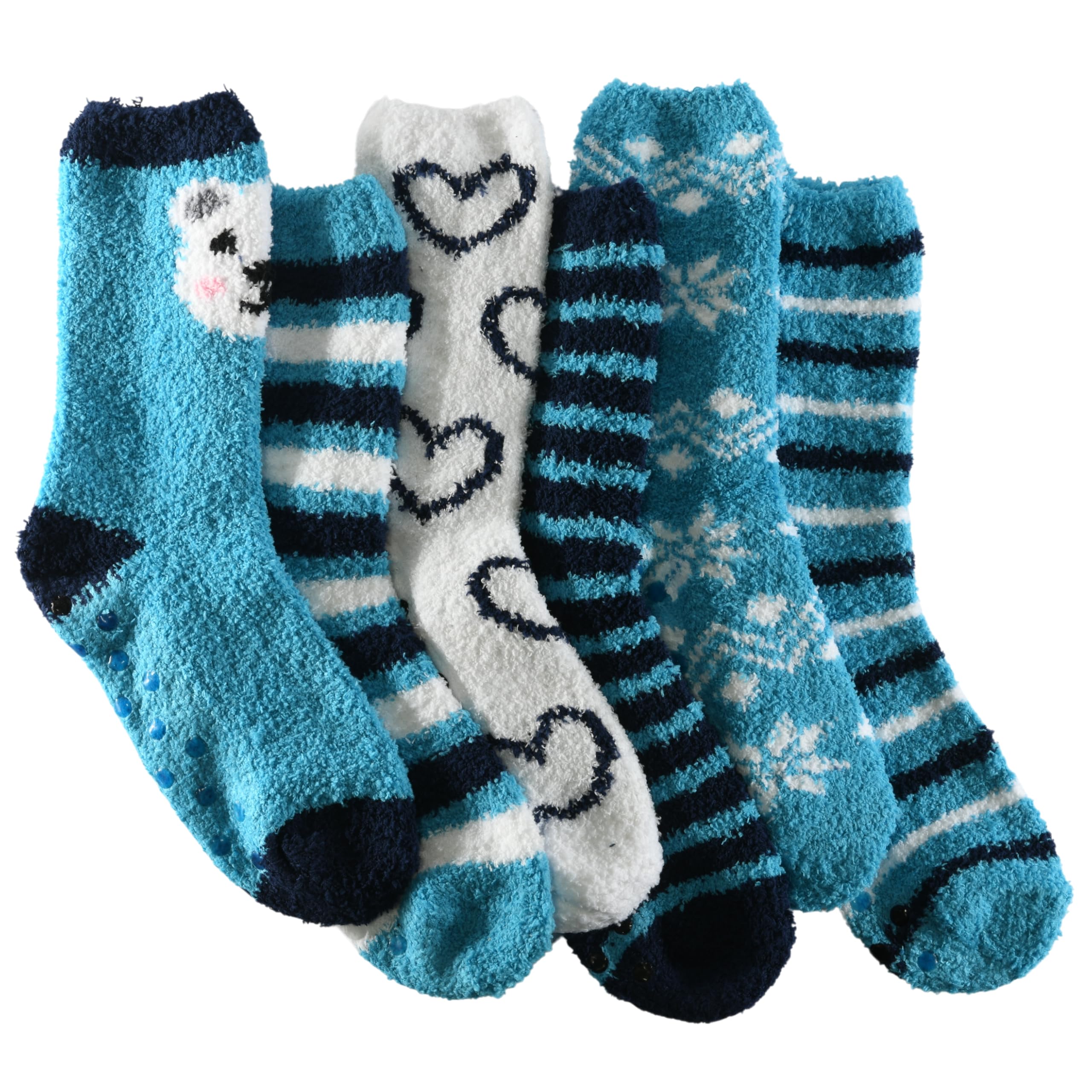 Five pairs of fuzzy socks arranged together on a white background. The socks feature various patterns including stripes, snowflakes, hearts, and a polar bear design in shades of blue, navy, and white.