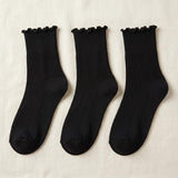 Solid Black Turn-Cuff Quarter Ruffle Socks