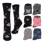 A set of novelty crew socks featuring cat-themed prints, shown on a plain white background. The collection includes black socks with pink hearts and cat faces, gray socks with black paw prints and a cat face, pink socks with a cartoon cat, blue socks with blue cat faces, and gray socks with orange rocket patterns.