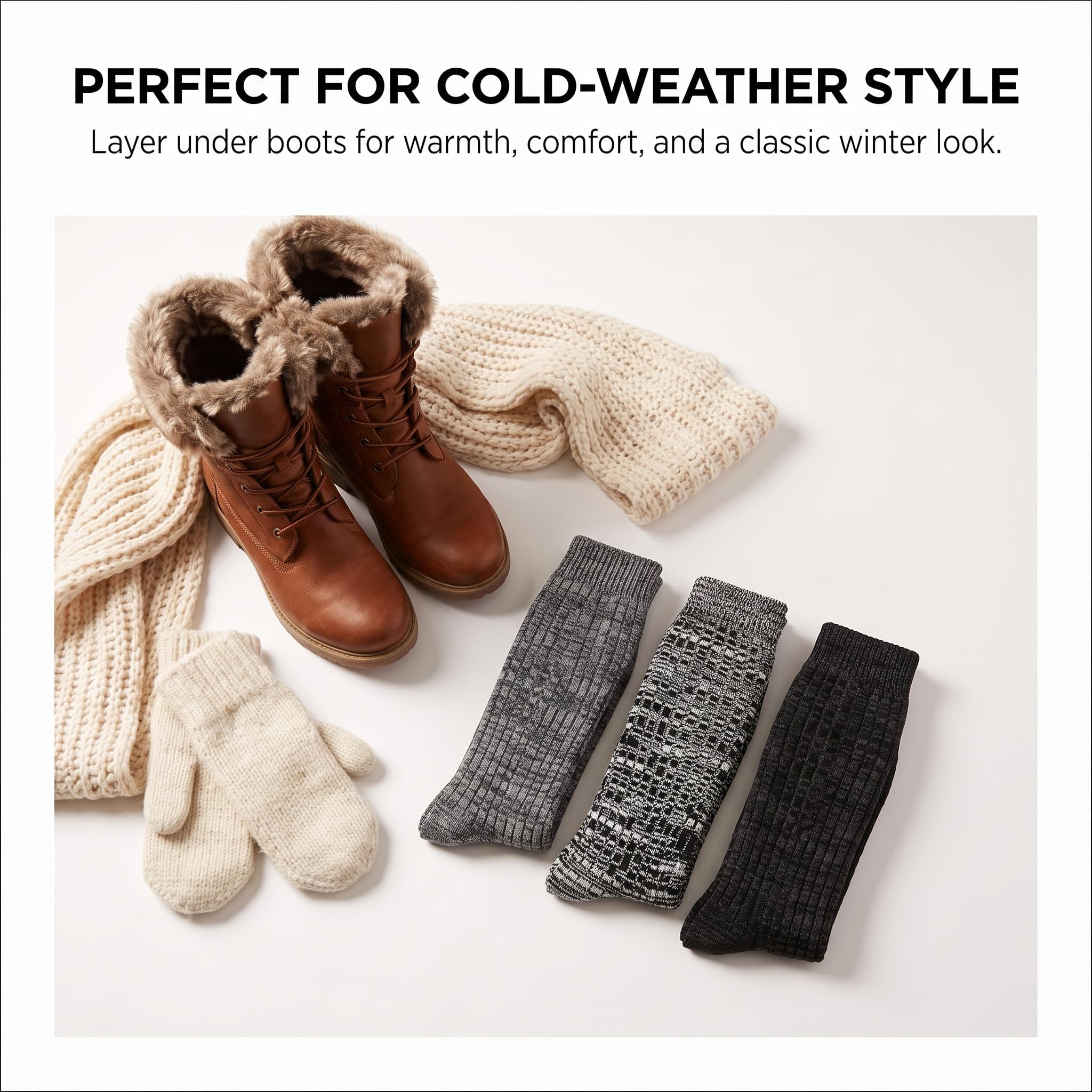 A flat-lay of winter apparel and accessories on a white background: brown lace-up boots with faux-fur trim, cream knit mittens, a cream knit scarf, and four pairs of socks in gray and black. Text at the top reads, 'PERFECT FOR COLD-WEATHER STYLE' with a smaller descriptive line.