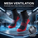 A pair of athletic ankle socks floating in a futuristic lab-like setting with text reading 'MESH VENTILATION' and 'Breathable fabric helps release heat and moisture.' The socks are black with red toe, heel, and side panel accents, plus a circular inset showing the knit texture.