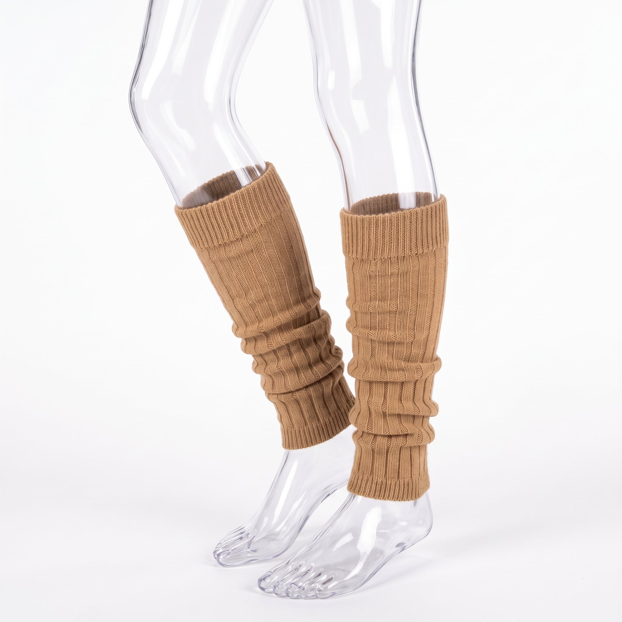 A pair of ribbed knit leg warmers in camel brown, shown on clear mannequin legs against a plain white background.