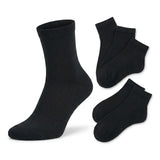 A set of black ankle socks displayed on a clean white background, featuring one larger sock on the left and four smaller pairs fanned out on the right.