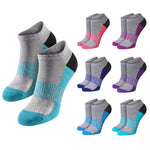 A set of low-cut athletic socks shown on a plain white background, with one larger pair in front and nine smaller pairs arranged behind it. The front pair is heather gray with turquoise and black sections, and the smaller pairs come in pink, blue, and purple colorways.
