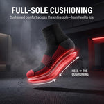A single athletic sock floating in a dark gym-like setting with glowing red sole layers and text reading 'FULL-SOLE CUSHIONING' and 'HEEL -> TOE CUSHIONING'.