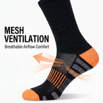 A single black athletic sock with bright orange and gray accents, shown on a white background with marketing text reading 'MESH VENTILATION' and airflow graphic overlays.