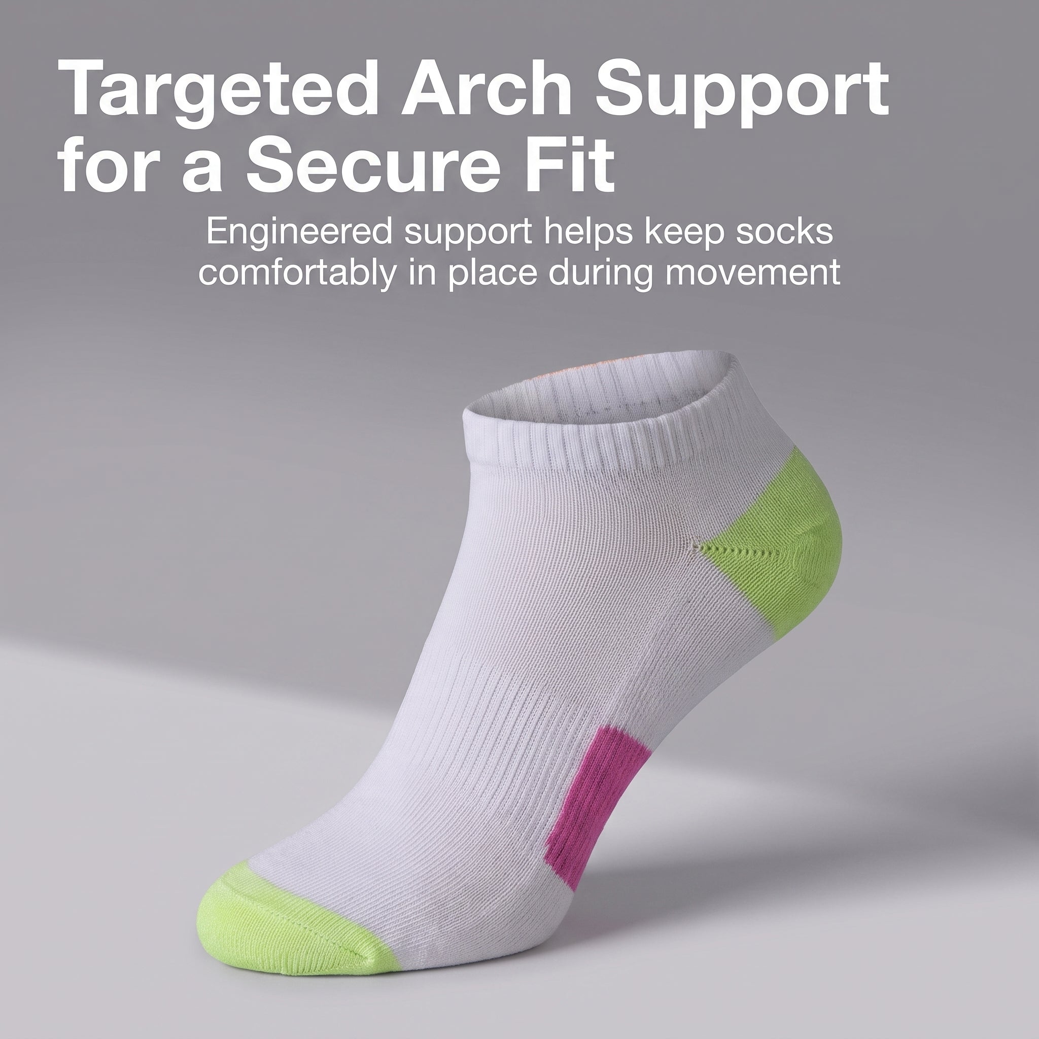 A single low-cut athletic sock shown on a neutral gray background with promotional text at the top. The sock is primarily white with a bright lime green toe and heel section and a pink arch support section on the instep.