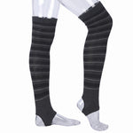 Black and gray striped over-the-knee compression sleeves shown on a transparent mannequin leg form against a white background.