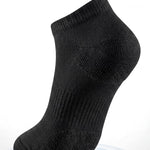 Black sock with cushioned sole on a white background
