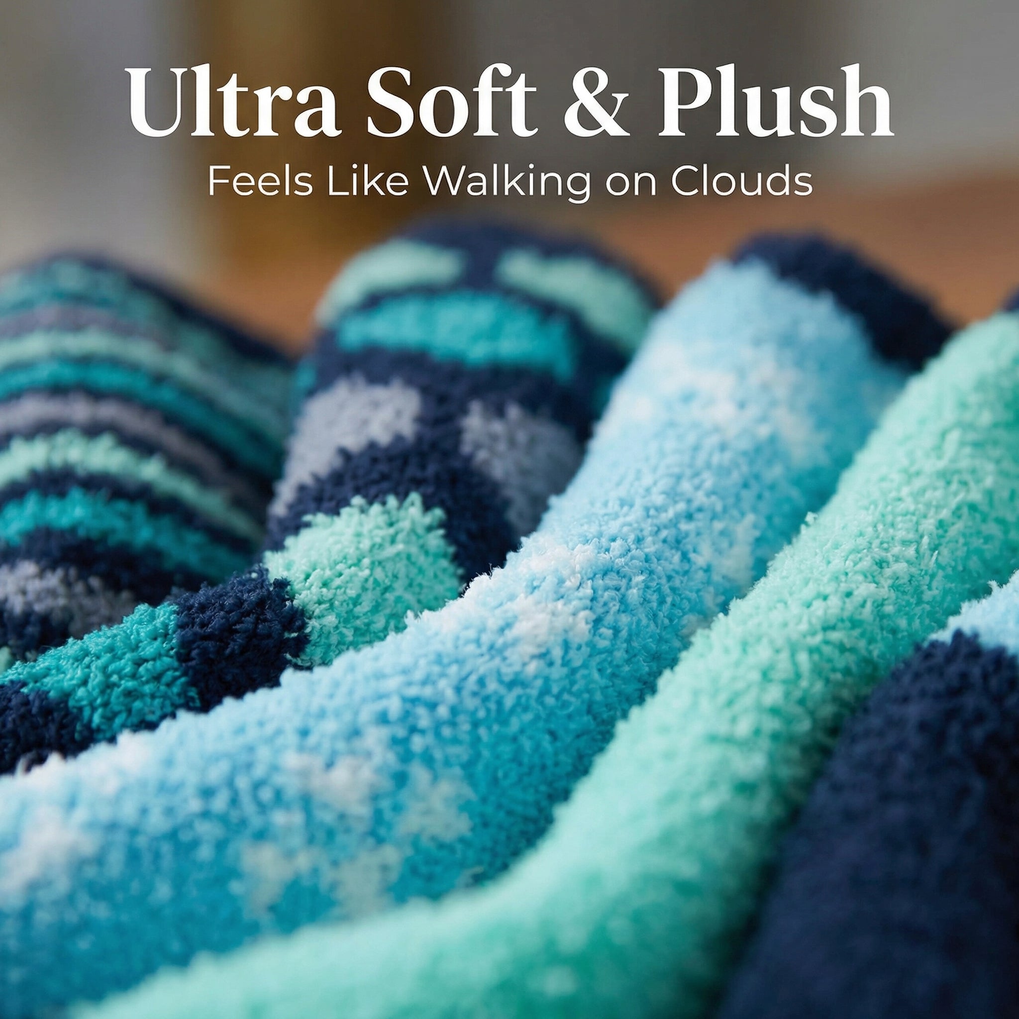 Close-up of a blue and green striped blanket with text 'Ultra Soft & Plush, Feels Like Walking on Clouds'.