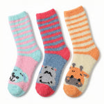 Three pairs of striped socks with animal faces on a white background