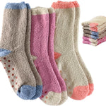 Set of colorful socks with a stack of additional pairs in the background.