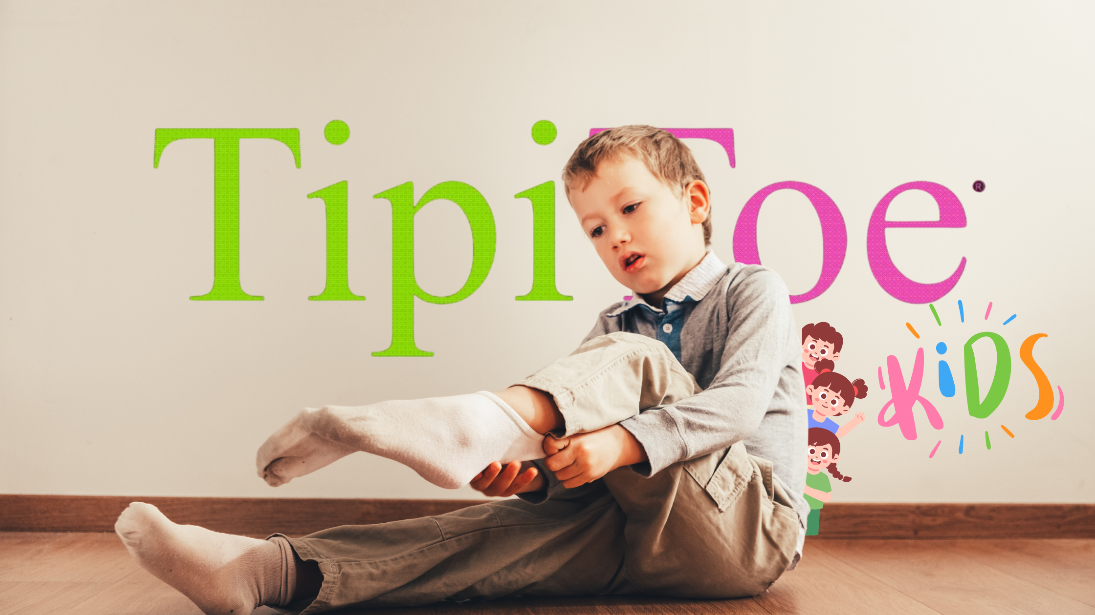 Child sitting on the floor with 'Tipi Toe Kids' branding in the background