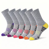 Six pairs of gray crew socks arranged in a fan shape on a white background, each with different accent colors on the toe, heel, and striped details.