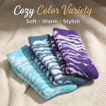 Three pairs of striped socks in blue, purple, and white on a beige fabric background with text 'Cozy Color Variety'.