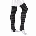 Black and gray striped over-the-knee compression socks shown on a clear mannequin leg form against a white background.