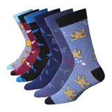 Set of colorful socks with oceanic patterns on a white background