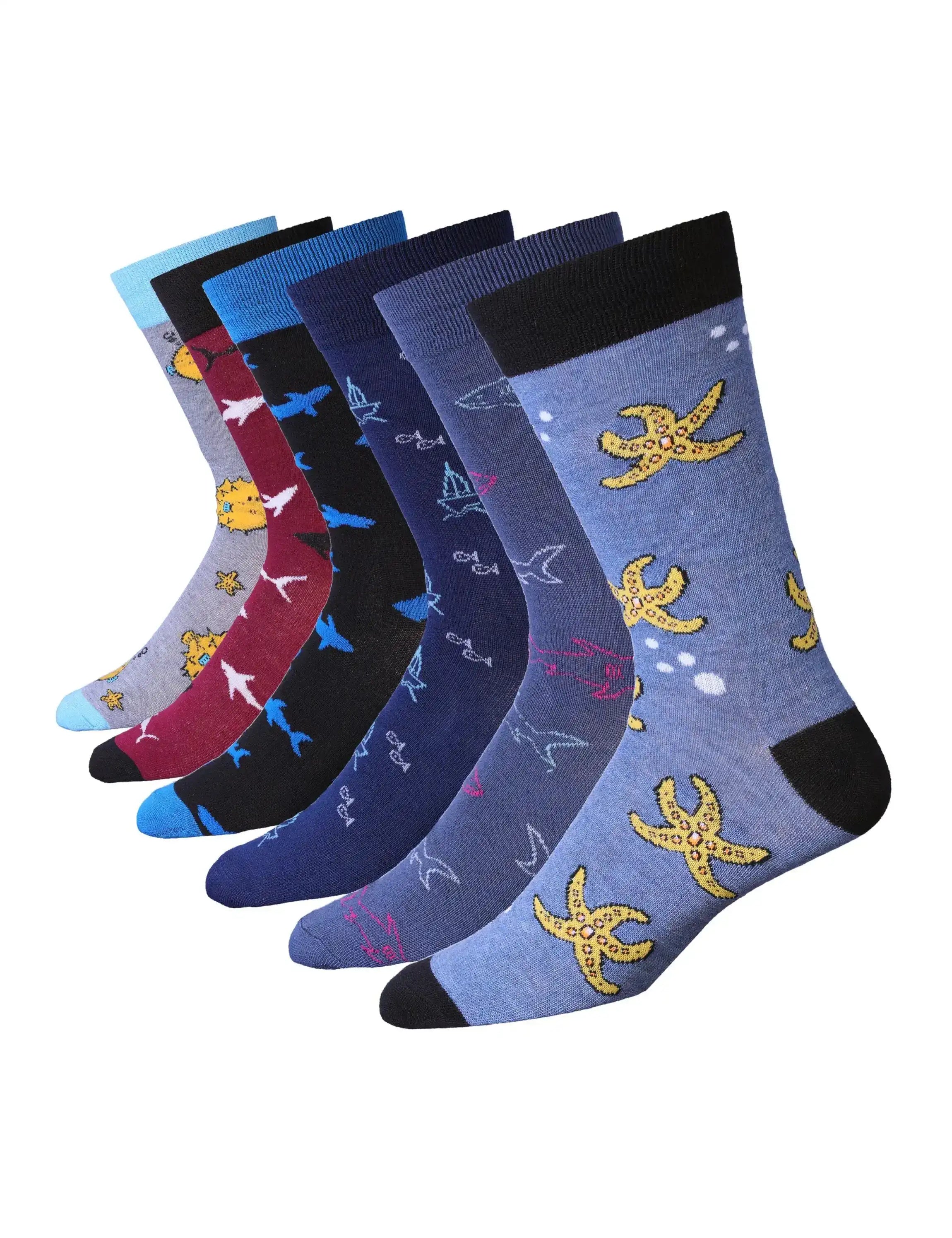 Set of colorful socks with oceanic patterns on a white background