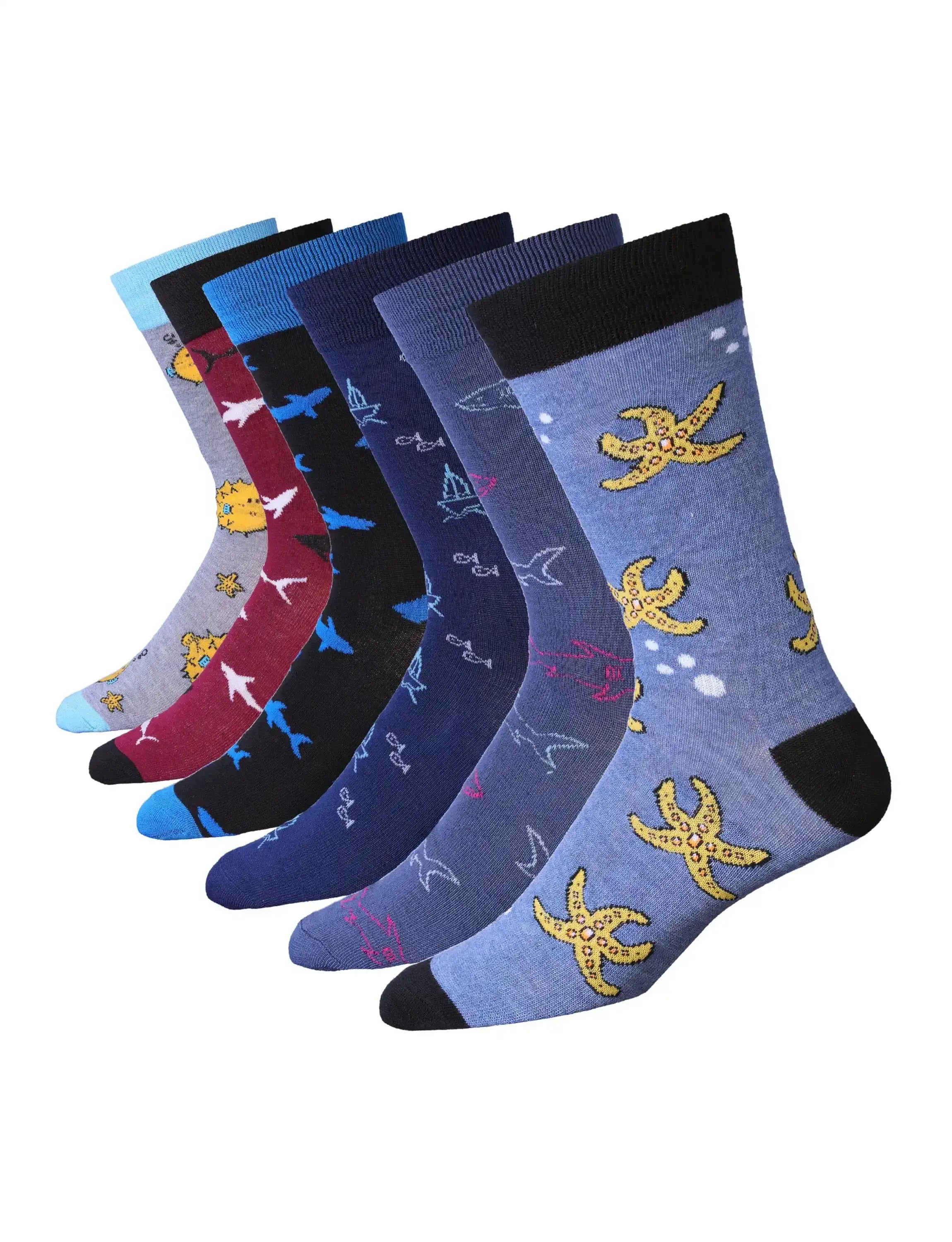 Set of colorful socks with oceanic patterns on a white background