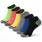 Set of colorful socks with different patterns on a white background