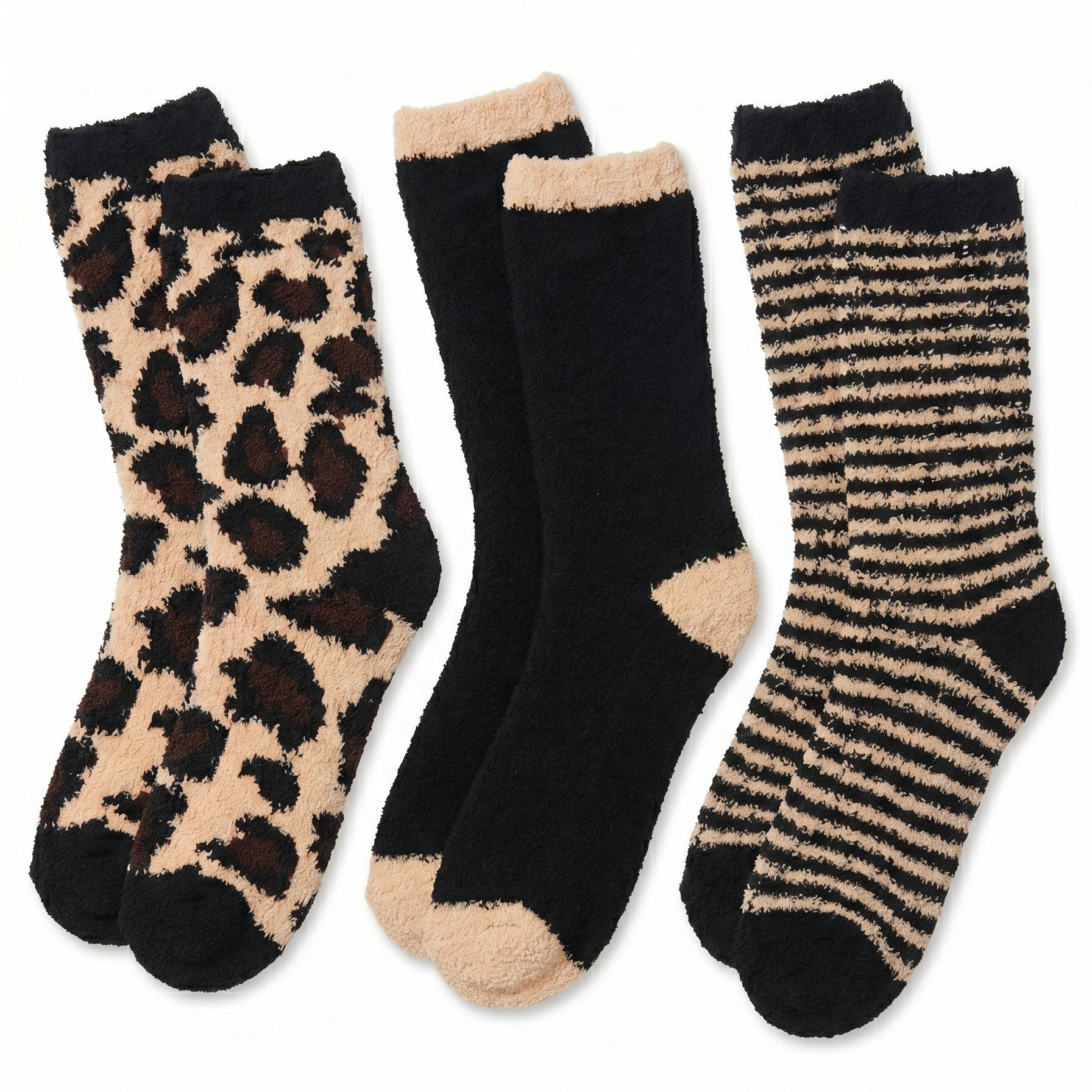 Set of three pairs of socks with leopard print, black and beige, and striped patterns on a white background.