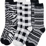 Set of three patterned socks on a white background