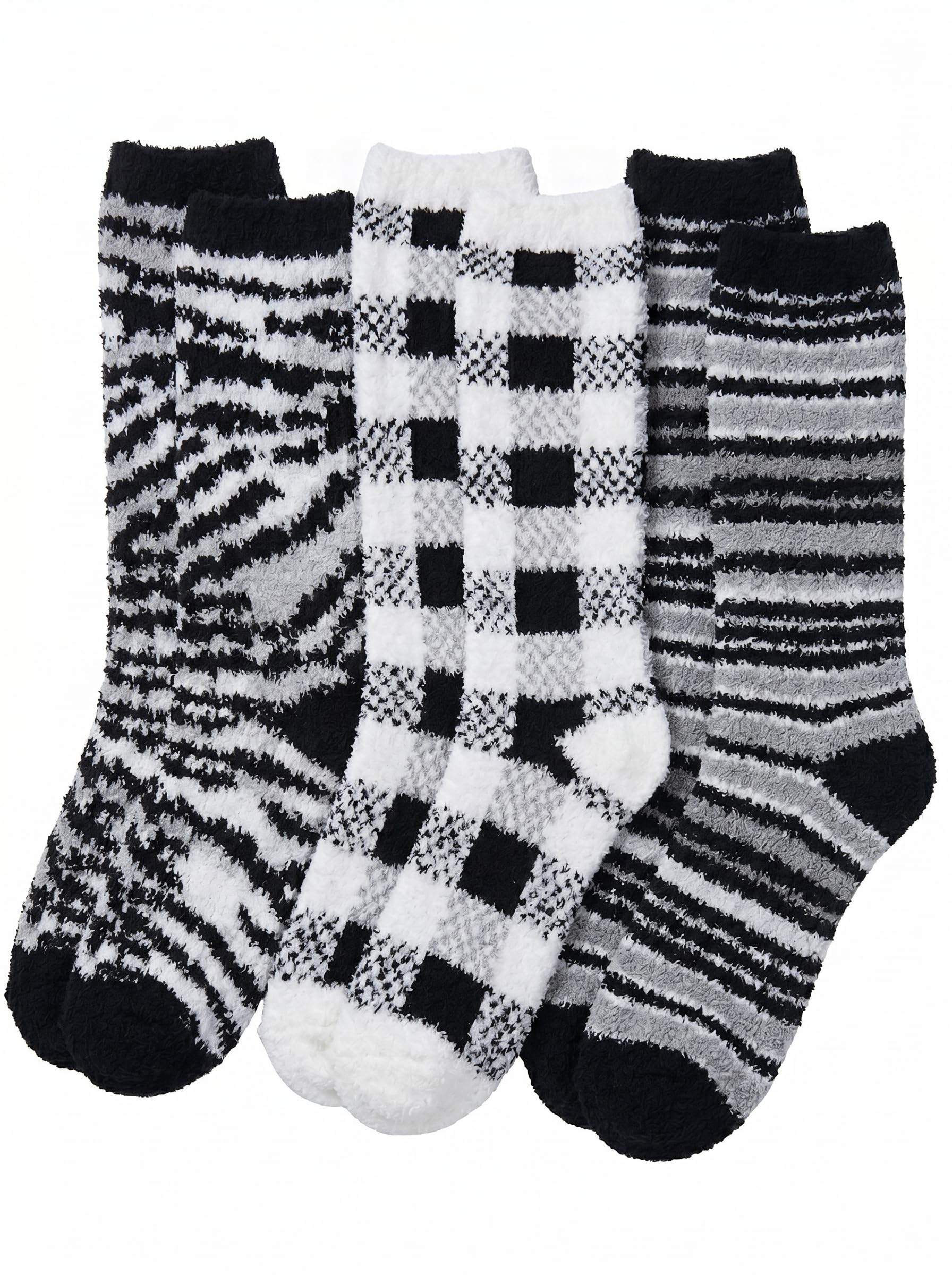 Set of three patterned socks on a white background