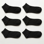 Six black ankle socks arranged in two columns of three on a plain white background.