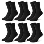 Twelve pairs of black crew socks arranged in two rows of six on a plain white background.