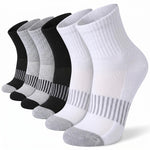 Six pairs of athletic ankle socks arranged in a fan shape on a white background. The set includes four black and two white pairs, each with gray striped accents on the lower leg and gray toe/heel sections.