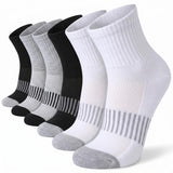 Six pairs of athletic ankle socks arranged in a fan shape on a white background. The set includes four black and two white pairs, each with gray striped accents on the lower leg and gray toe/heel sections.