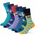 Six pairs of cartoon monster crew socks in various colors and patterns, arranged in a fan shape on a white background.