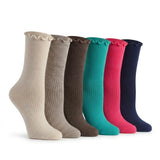 Six ribbed crew socks with ruffled cuffs arranged in a row on a white background. The colors are light beige, taupe, brown, teal, hot pink, and navy blue.