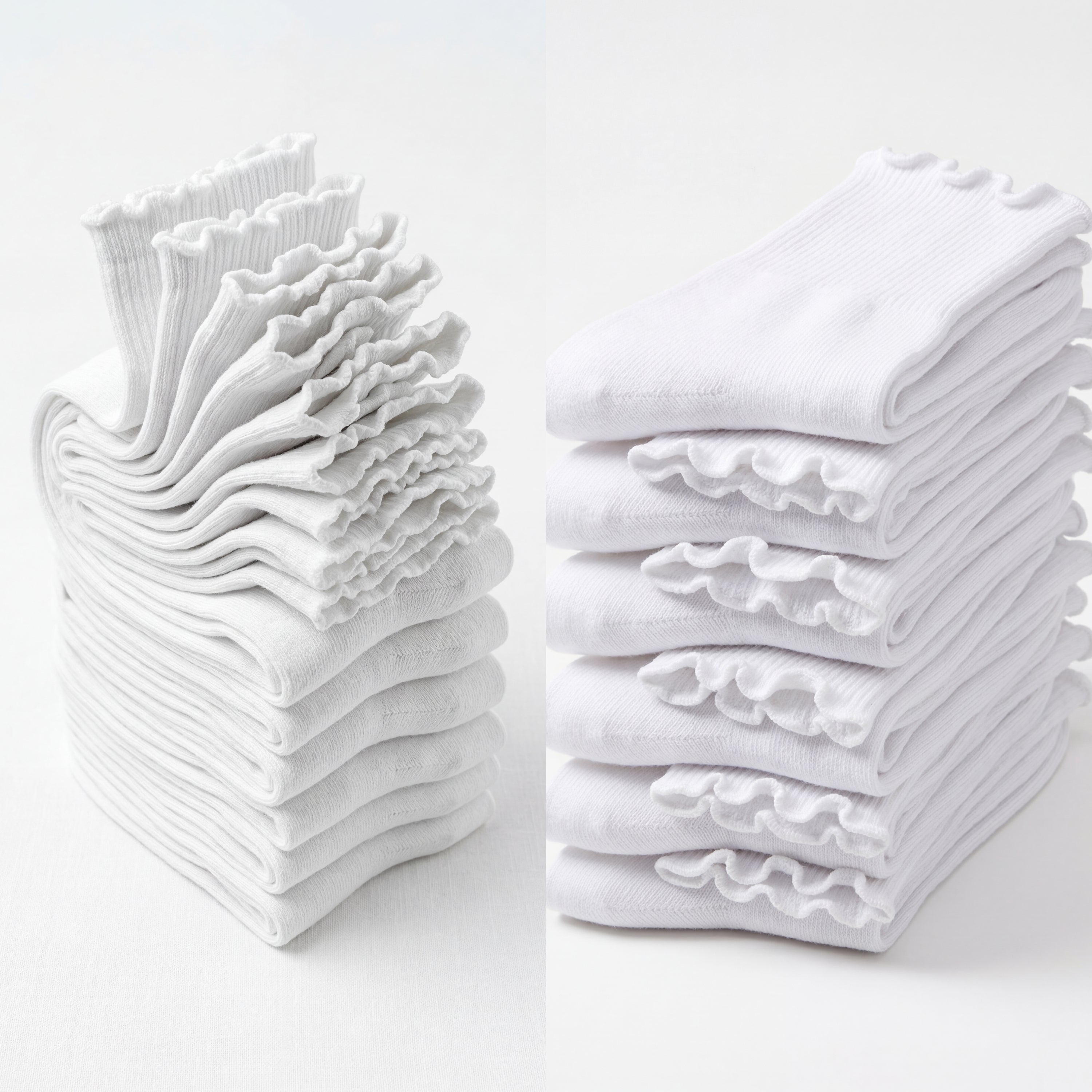 Stacks of white folded socks on a light gray background