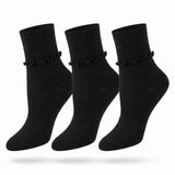 Three black ankle socks with a ruffled trim at the cuff, shown in a three-pack on a white background.