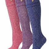 Three knee-high ribbed socks in pink, purple, and blue heathered knit, each with two decorative wooden buttons near the top cuff, shown on a white background.