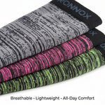Three pairs of athletic compression sleeves stacked diagonally on a white background, featuring a gray/black pattern, a pink/black pattern, and a green/black pattern. The top pair has 'RONNOX' printed on the cuff.