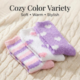 Three pairs of soft, warm, and stylish socks in pastel colors on a textured surface.