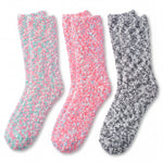 Three pairs of textured socks in pink, blue, and gray on a white background