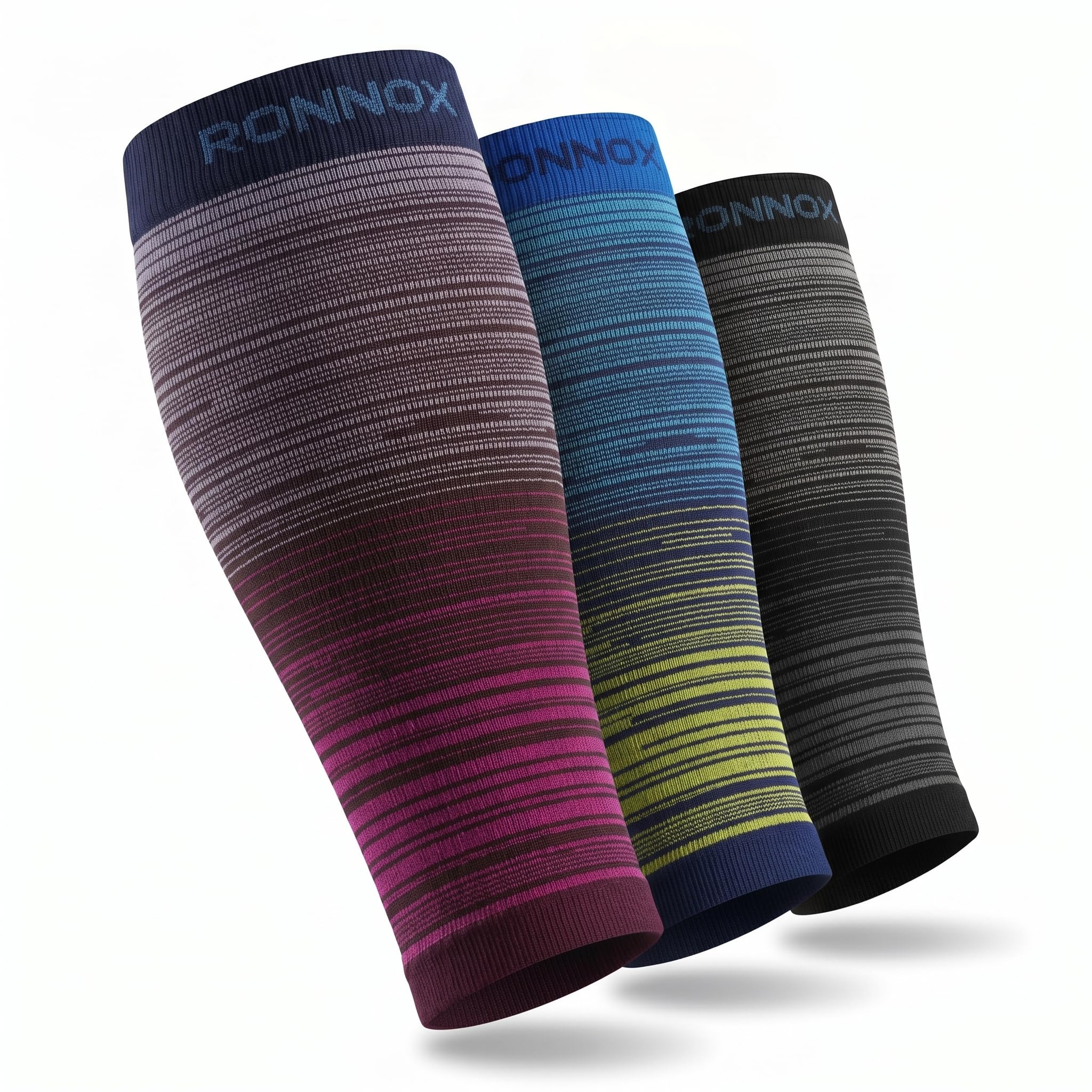 Three ribbed compression calf sleeves with horizontal color bands, shown on a white background. The sleeve on the left is navy, gray, and magenta.
