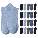 Two heather light blue ankle socks displayed prominently on the left, with a grid of 16 smaller ankle socks in various colors (black, light blue, gray, navy) arranged on the right, all on a plain white background.