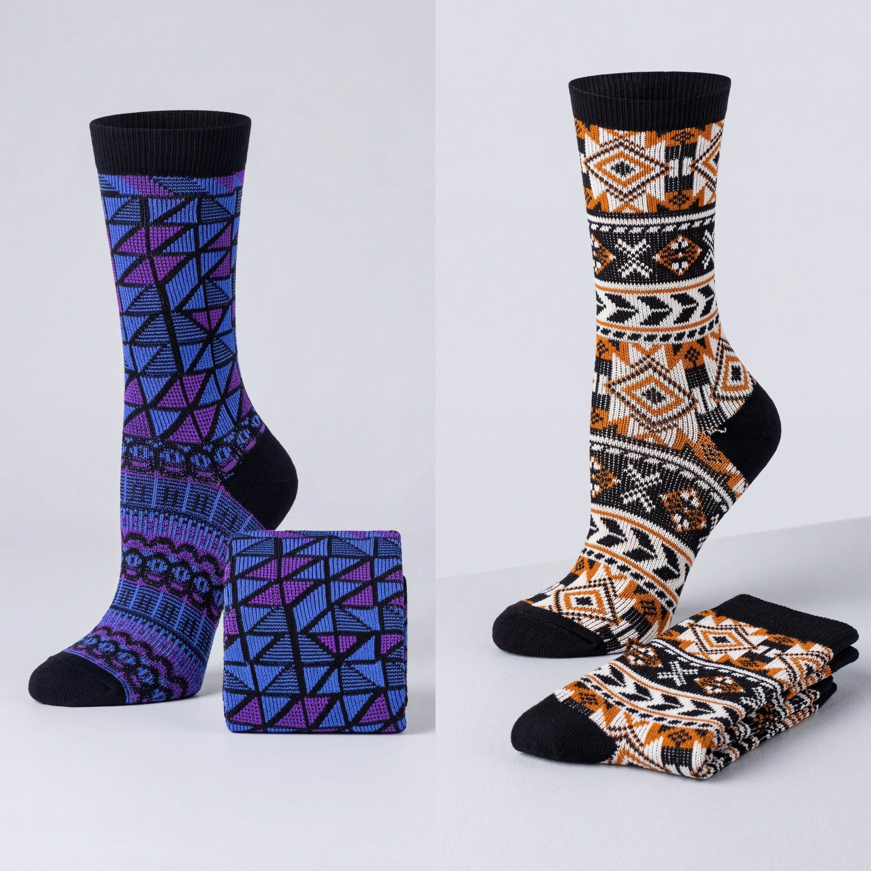 Two pairs of patterned socks with a small box on a light gray background